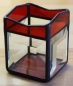 Preview: Tea light holder,stained glass,tiffany technique,dark red,opalescent,with square bevels,clear,size 5,5 x 5,5 x 7,5 cm,manufactured in our own atelier,item number 10027-A.Carmen Harusta,Glasinsel ®,Goettingen,Germany.