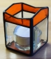 Preview: Tea light holder,stained glass,tiffany technique,orange,semi transparent,with square bevels,clear,size 5,5 x 5,5 x 7,5 cm,manufactured in our own atelier,item number 10027-F.Carmen Harusta,Glasinsel ®,Goettingen,Germany.