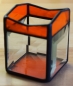 Preview: Tea light holder,stained glass,tiffany technique,orange,semi transparent,with square bevels,clear,size 5,5 x 5,5 x 7,5 cm,manufactured in our own atelier,item number 10027-F.Carmen Harusta,Glasinsel ®,Goettingen,Germany.