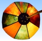 Preview: Hanging lamp " Paula ",stained glass,yellow,red,orange,green,white,brown,diameter ca. 26,5 cm,item number 1079,manufactured in our own atelier in Goettingen,Germany,top view,on.