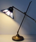 Preview: Schwenkbare und höhenverstellbare Tischleuchte,Tiffany-Glaskunst,blau,türkis,violett,hellblau,Schirmdurchmesser ca. 20 cm,Artikelnummer 2068-C,an.