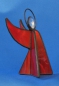 Preview: Standing angel,stained glass,red,light orange,opalescent,with faceted glass stone,clear,height ca. 9,5 cm,item number 30039A,manufactured in our own atelier.Carmen Harusta,Glasinsel ®,Goettingen,Germeny (side view).
