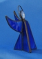 Preview: Standing angel,stained glass,dark blue,opalescent,with faceted glass stone,clear,height ca. 9,5 cm,item number 30039B,manufactured in our own atelier.Carmen Harusta,Glasinsel ®,Goettingen,Germeny (side view).