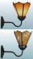 Preview: Wandleuchte,Wandfluter mit braunem Wandarm und mit Lampenschirm,Durchmesser ca. 14,5 cm,Tiffany-Glaskunst,hellbraun,amber,Opalescentglas,Artikelnummer 70048002 b.Carmen Harusta,Glasinsel ®,Göttingen,Deutschland.