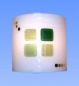 Preview: Wall lamp " Green Squares ",glass fusing,white,green,yellow,amber,ca. 25 x 25 x 9,5 cm,item number 130003,manufactured in our own atelier.Carmen Harusta,Glasinsel ®,Goettingen,Germany.(on)