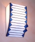 Preview: Wall lamp " Toska ",stained glass,white,blue,width ca. 13 cm,height ca. 19,5 cm,item number 3042,manufactured in our own atelier.Carmen Harusta,Glasinsel ®,Goettingen,Germany.