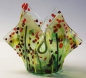 Preview: Glas-Windlicht für Teelicht,grün,rot,orange und gelb auf klar,Höhe ca. 10 cm,Durchmesser ca. 15 cm,gefertigt in unserem eigenen Atelier,Art.Nr. FW1.Carmen Harusta,Glasinsel ®,Göttingen,Deutschland. (Abb. 2).