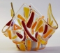 Preview: Glass tea light holder,red and orange on clear,height ca. 10 cm,diameter ca. 15 cm,manufactured in our own studio,item number FW14.Carmen Harusta,Glasinsel ®,Göttingen,Germany. (image 1).