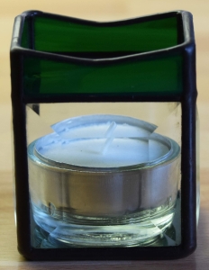 Tea light holder,stained glass,tiffany technique,dark green,opalescent,with square bevels,clear,size 5,5 x 5,5 x 7,5 cm,manufactured in our own atelier,item number 10027-E.Carmen Harusta,Glasinsel ®,Goettingen,Germany.