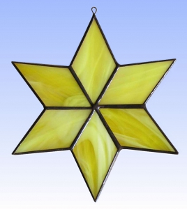 Suncatcher " Star ",stained glass,yellow,white,opalescent,diameter ca. 13 cm,item number 30074C,manufactured in our own atelier.Carmen Harusta,Glasinsel ®,Goettingen,Germany.