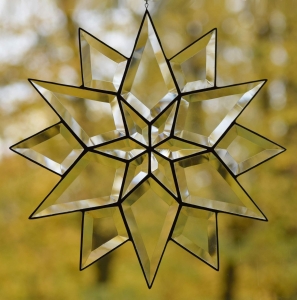 Suncatcher " Beveled Glass Star ",tiffany technique,clear,diameter ca. 30 cm,item number 30111,manufactured for you in our own atelier.Carmen Harusta,Glasinsel ®,Goettingen,Germany.
