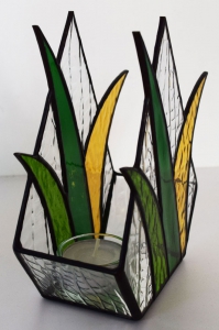 Tea light holder,stained glass,tiffany technique,green,light green,light amber,height ca. 16,5 cm,manufactured in our own atelier,item number 10048-A.Carmen Harusta,Glasinsel ®,Goettingen,Germany.
