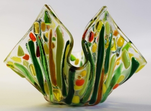 Glass tea light holder,dark green,green,light green,yellow,orange,amber on clear,height ca. 10 cm,diameter ca. 15 cm,manufactured in our own studio,item number FW13.Carmen Harusta,Glasinsel ®,Göttingen,Germany. (image 2).