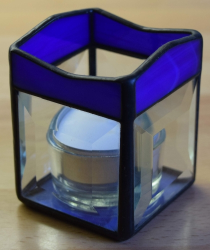 Tea light holder,stained glass,tiffany technique,dark blue,opalescent,with square bevels,clear,size 5,5 x 5,5 x 7,5 cm,manufactured in our own atelier,item number 10027-B.Carmen Harusta,Glasinsel ®,Goettingen,Germany.