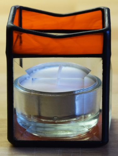 Tea light holder,stained glass,tiffany technique,orange,semi transparent,with square bevels,clear,size 5,5 x 5,5 x 7,5 cm,manufactured in our own atelier,item number 10027-F.Carmen Harusta,Glasinsel ®,Goettingen,Germany.