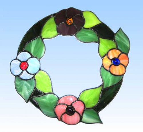 Stained glass suncatcher,window picture," Flower-Garland ",diameter 22 cm,item number 20214,manufactured in our own atelier.Carmen Harusta,Glasinsel ®,Goettingen,Germany.