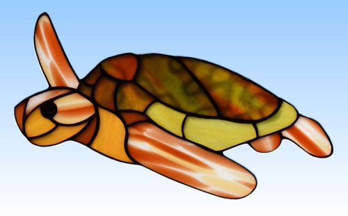 Stained glass suncatcher,window picture," Sea Turtle ",13 x 21 cm,item number 20273,manufactured in our own atelier.Carmen Harusta,Glasinsel ®,Goettingen,Germany.