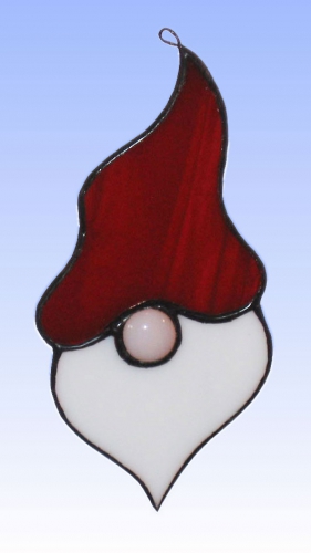 Suncatcher " Santa Claus With Large Hat ",stained glass,red,white,champagner,opalescent,ca. 12 x 6 cm,item number 30054,manufactured in our own atelier.Carmen Harusta,Glasinsel ®,Goettingen,Germeny.