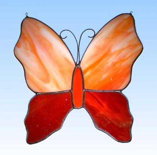 Stained glass suncatcher,window picture," Butterfly ",15 x 15 cm,item number 20097,manufactured in our own atelier.Carmen Harusta,Glasinsel ®,Goettingen,Germany.