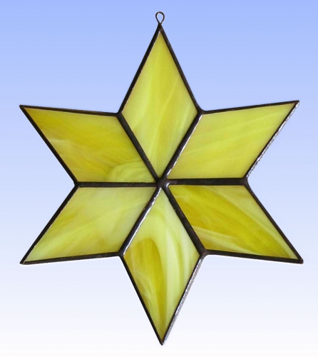Suncatcher " Star ",stained glass,yellow,white,opalescent,diameter ca. 13 cm,item number 30074C,manufactured in our own atelier.Carmen Harusta,Glasinsel ®,Goettingen,Germany.
