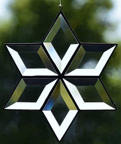 Suncatcher " Beveled Glass Star ",tiffany technique,clear,diameter ca. 15 cm,item number 30102,manufactured for you in our own atelier.Carmen Harusta,Glasinsel ®,Goettingen,Germany.