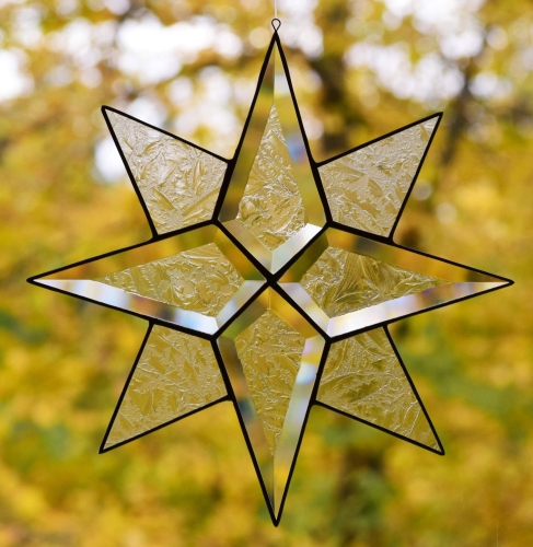 Suncatcher " Star ",tiffany technique,clear glue chip beveled glass and clear glue chip glass,diameter ca. 24,5 cm,item number 30110,manufactured for you in our own atelier.Carmen Harusta,Glasinsel ®,Göttingen,Germany.