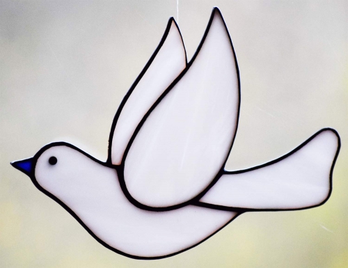 Suncatcher " Pigeon ",stained glass,tiffany technique,white,opalescent,height ca. 13 cm,width ca. 18 cm,item number 20191B,manufactured in our own atelier.Carmen Harusta,Glasinsel ®,Göttingen,Germany.