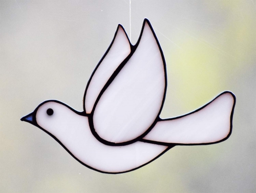Suncatcher " Pigeon ",stained glass,tiffany technique,white,opalescent,height ca. 9 cm,width ca. 13 cm,item number 20191BK,manufactured in our own atelier.Carmen Harusta,Glasinsel ®,Göttingen,Germany.