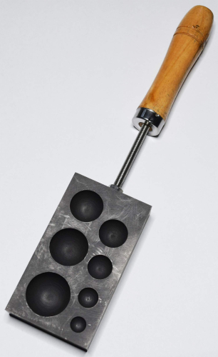 Graphite marble molds,with 7 different trough sizes,Ø ca. 9,12,15,18,20,24,27 mm,with wooden handle,,item number 9121518.