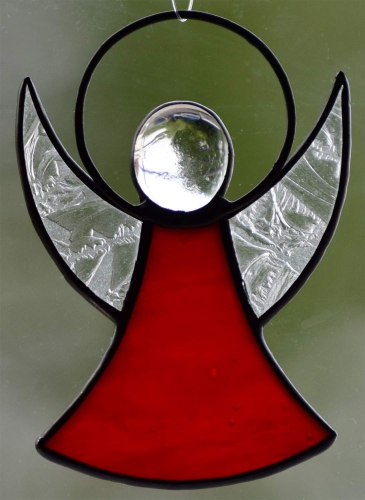 Guardian Angel,stained glass;dress: red,opalescent;wings: glue chip glass,clear;head: glass nugget,clear,size ca. 7 x 5 cm,manufactured in our own atelier,item number 30060A.Carmen Harusta,Glasinsel ®,Goettingen,Germany.