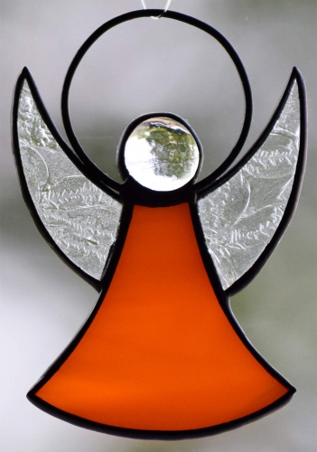 Guardian Angel,stained glass;dress: orange,opalescent;wings: glue chip glass,clear;head: glass nugget,clear,size ca. 7 x 5 cm,manufactured in our own atelier,item number 30060E.Carmen Harusta,Glasinsel ®,Goettingen,Germany.
