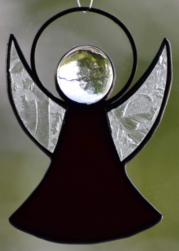 Guardian Angel,stained glass;dress: dark violet,opalescent;wings: glue chip glass,clear;head: glass nugget,clear,size ca. 7 x 5 cm,manufactured in our own atelier,item number 30060F.Carmen Harusta,Glasinsel ®,Goettingen,Germany.