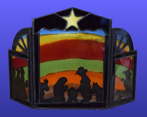 Standing three-piece crib,size ca. 24 x 19 x 6 cm,glass fusing,tiffany technique,,with 3 tea lights,item number 30080,manufactured in our own atelier.Carmen Harusta,Glasinsel ®,Goettingen,Germany.(image without tea lights)