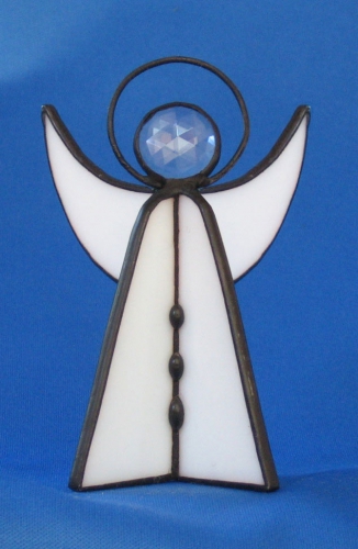 Standing angel,stained glass,white,opalescent,with faceted glass stone,clear,height ca. 9,5 cm,item number 30039D,manufactured in our own atelier.Carmen Harusta,Glasinsel ®,Goettingen,Germeny (front view).