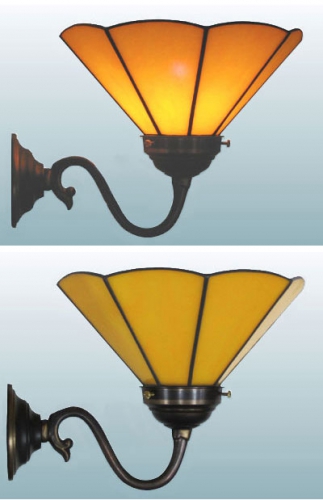 Wall lamp,wall washer with antique wall bracket and with stained glass lampshade,diameter ca. 21 cm,sunflower yellow,opalescent,item number 70028003 b,manufactured in our own atelier.Carmen Harusta,Glasinsel ®,Goettingen,Germany.