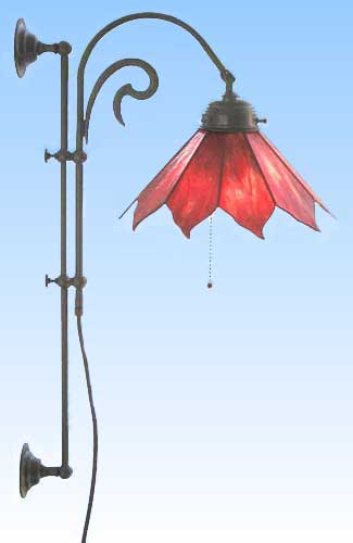 Wall lamp Flame,height adjustable,with swing arm,stained glass lampshade,diameter ca. 25 cm,opalescent glass,colour red-orange,item number 3151manufactured in our own atelier.Carmen Harusta,Glasinsel ®,Göttingen,Germany.