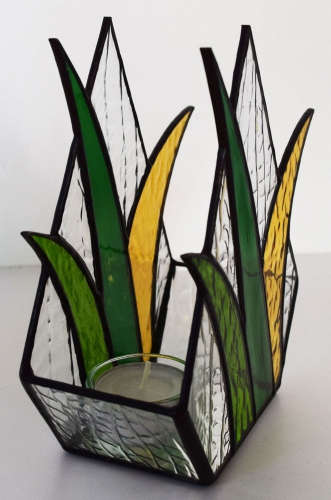 Tea light holder,stained glass,tiffany technique,green,light green,light amber,height ca. 16,5 cm,manufactured in our own atelier,item number 10048-A.Carmen Harusta,Glasinsel ®,Goettingen,Germany.