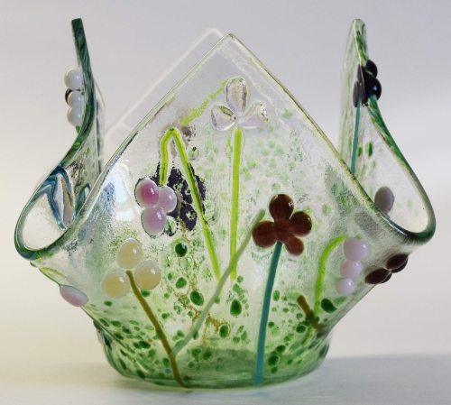 Glass tea light holder,green.light green,turquoise green,pink,dark lilac,white on clear,height ca. 10 cm,diameter ca. 15 cm,manufactured in our own studio,item number FW10.Carmen Harusta,Glasinsel ®,Göttingen,Germany. (image 1).