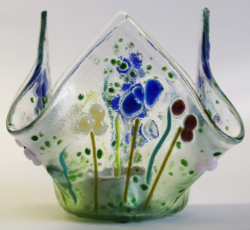Glass tea light holder,light green,olive green,blue,light blue,pink,lilac,white,turquoise green,ivory on clear,height ca. 10 cm,diameter ca. 15 cm,manufactured in our own studio,item number FW12.Carmen Harusta,Glasinsel ®,Göttingen,Germany. (image 1).