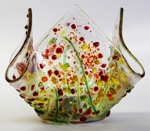 Glass tea light holder,green.light green,red,orange,yellow on clear,height ca. 10 cm,diameter ca. 15 cm,manufactured in our own studio,item number FW9.Carmen Harusta,Glasinsel ®,Göttingen,Germany. (image 1).